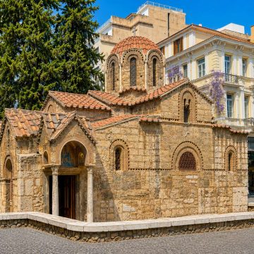 The Church of Panagia Kapnikarea is a charming Byzantine gem nestled in the heart of Athens' busiest shopping street. Built around 1050 over an ancient Greek temple, it is one of the city's oldest churches and was saved from demolition by King Otto’s intervention.