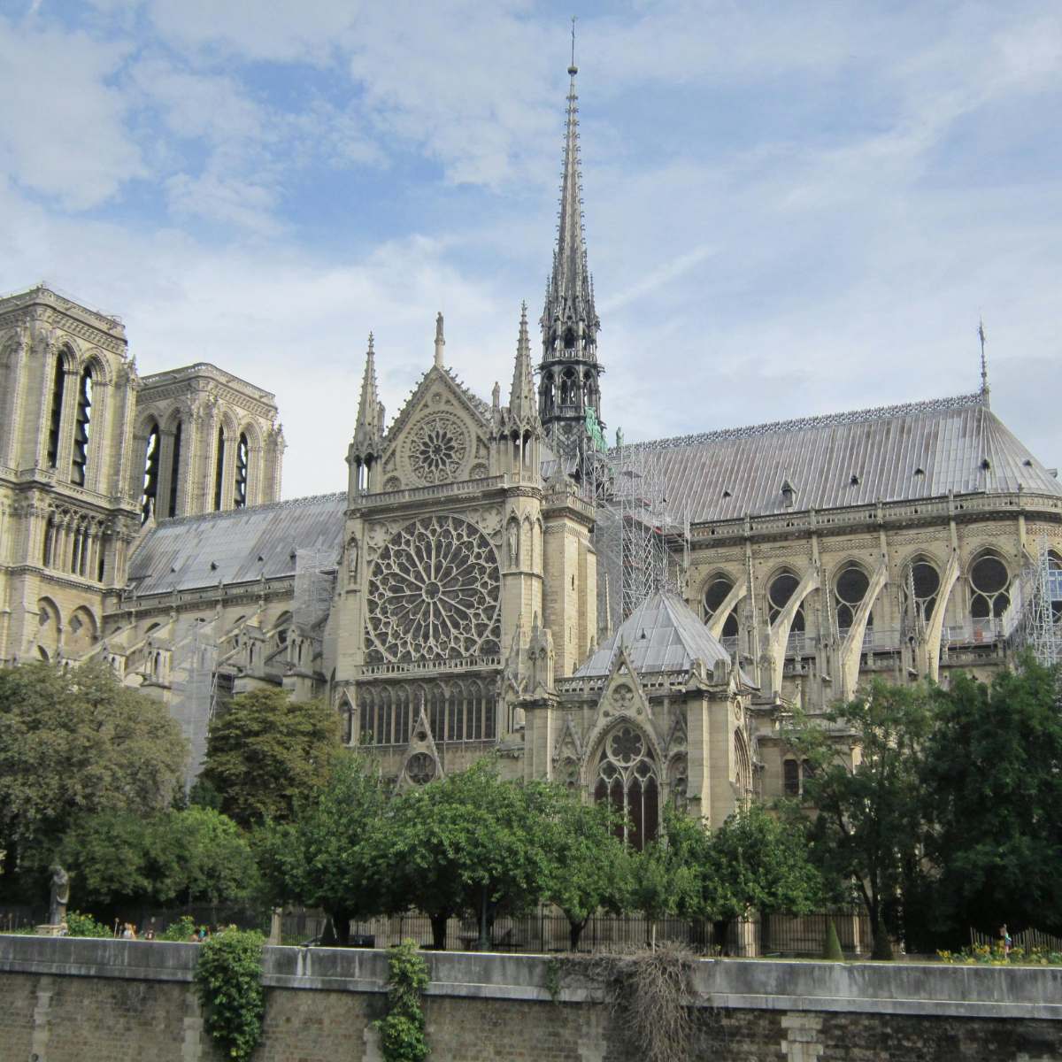 Paris Scavenger Hunt and Self-Guided Tour 6 Notre Dame Cathedral is a majestic Gothic masterpiece on the Île de la Cité where stunning rose windows and flying buttresses stand as a timeless symbol of Parisian history and resilience.
