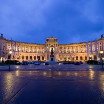 The Neue Burg is the grandest and most recent wing of the Hofburg Palace, standing as a monumental example of imperial architecture that overlooks the expansive Heldenplatz.
