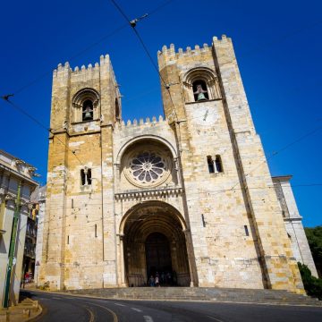 Dating back to the 12th century as the city's oldest church, the Lisbon Cathedral (Sé de Lisboa) is an imposing Romanesque fortress-like landmark that has withstood multiple devastating earthquakes while blending Gothic and Baroque architectural elements.