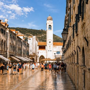 The Dubrovnik Clock Tower is an elegant 15th-century landmark on Luža Square, famous for its bronze "Maro and Baro" figures that strike the bell to mark the passing hours.
