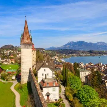 The Musegg Wall is a remarkably preserved 14th-century fortification that served as the defensive backbone of medieval Lucerne. This iconic stone rampart features nine massive towers, several of which are open to the public, offering visitors breathtaking panoramic views of the city, Lake Lucerne, and the surrounding Swiss Alps.
