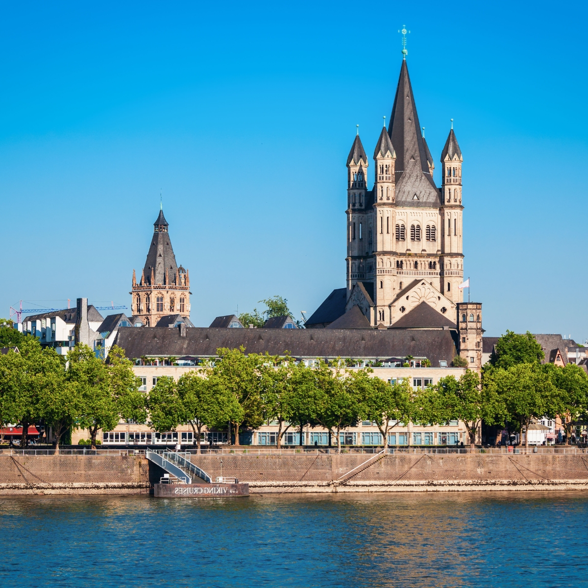 Cologne Scavenger Hunt and Self-Guided Tour 2 The Great St. Martin Church is a magnificent Romanesque basilica built upon the remains of a Roman warehouse, featuring a distinctive four-towered crossing that has defined Cologne's Old Town skyline since the 12th century.