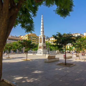 Plaza de la Merced is a lively historic square celebrated as the birthplace of Pablo Picasso and centered around the monumental Torrijos Obelisk.