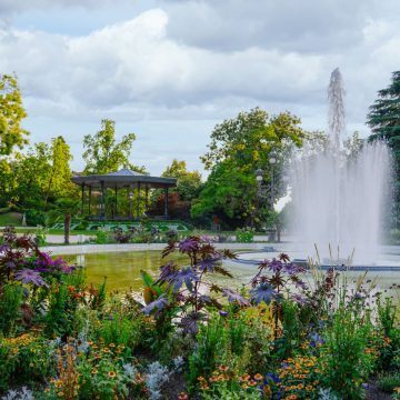 The Grand Rond is a majestic English-style landscape park where a grand central fountain and radiating tree-lined pathways create a monumental green oasis in the historic heart of Toulouse.
