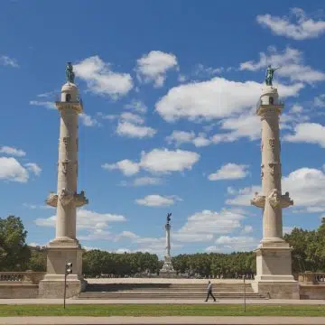Covering nearly 30 acres along the Garonne River, Place des Quinconces is one of the largest city squares in Europe, anchored by the towering Monument aux Girondins fountain.
