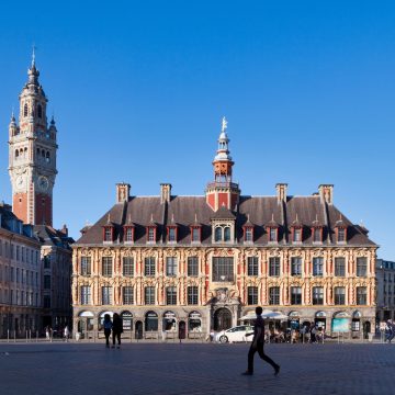 The Vieille Bourse is a 17th-century masterpiece of Flemish Renaissance architecture, consisting of twenty-four identical houses wrapped around a beautiful interior courtyard where locals often gather for book markets and chess.