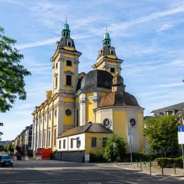 Situated in the heart of the Altstadt, the 17th-century Church of St. Andreas stands as a masterpiece of South German Baroque architecture and serves as the historic burial site of the Electors of the Palatinate.