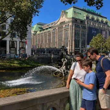 Anchoring the northern end of the iconic Königsallee canal, the dramatic 19th-century Tritonenbrunnen fountain depicts the Greek sea god Triton wrestling a sea monster amidst cascading waters.