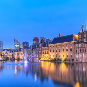 Binnenhof Palace is a majestic Gothic complex where a grand historic courtyard and the iconic Ridderzaal create a monumental center of Dutch political history.