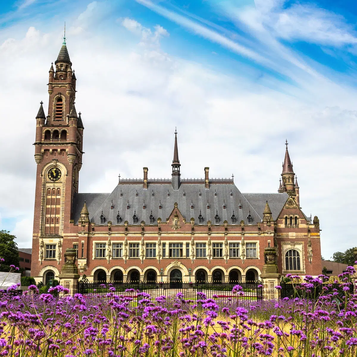 The Hague Scavenger Hunt and Self-Guided Tour 2 Peace Palace is a majestic Neo-Renaissance landmark where a grand facade and the pursuit of international justice create a monumental symbol of global harmony.