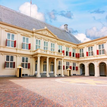 Noordeinde Palace is a majestic working palace where a grand neoclassical facade and elegant royal gardens create a monumental landmark in the heart of The Hague.