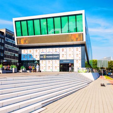 The German Football Museum is a modern architectural landmark that celebrates the nation's rich sporting heritage through immersive exhibits and interactive displays.