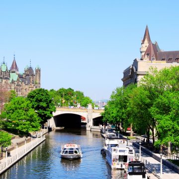 The Rideau Canal is a historic UNESCO World Heritage site that serves as a scenic waterway in summer and transforms into the world’s largest naturally frozen skating rink during the winter months.
