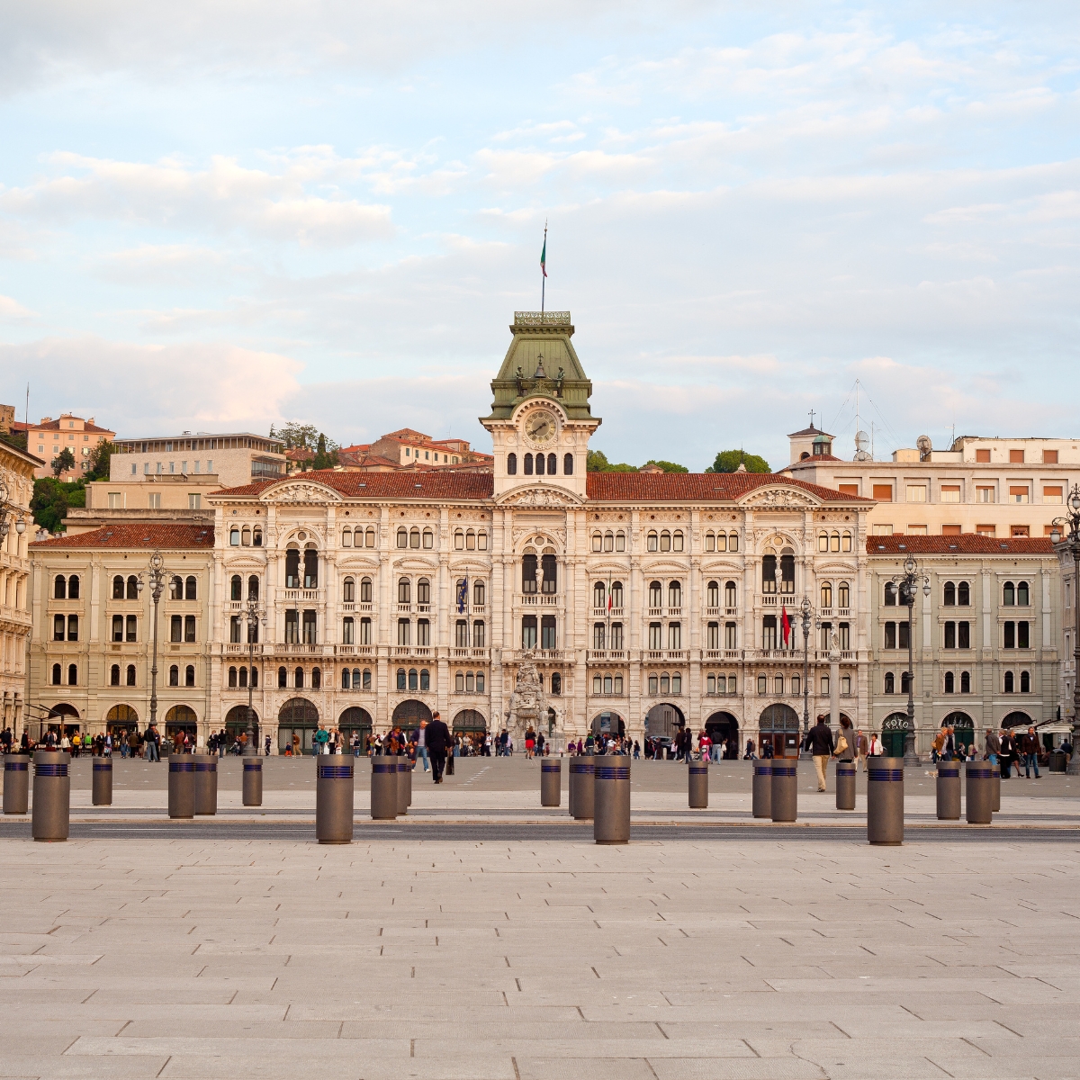 Trieste Scavenger Hunt and Self-Guided Tour 6 Piazza Unità d'Italia is Europe's largest sea-facing square, a grand space surrounded by magnificent neoclassical buildings that look out onto the blue waters of the Gulf of Trieste.