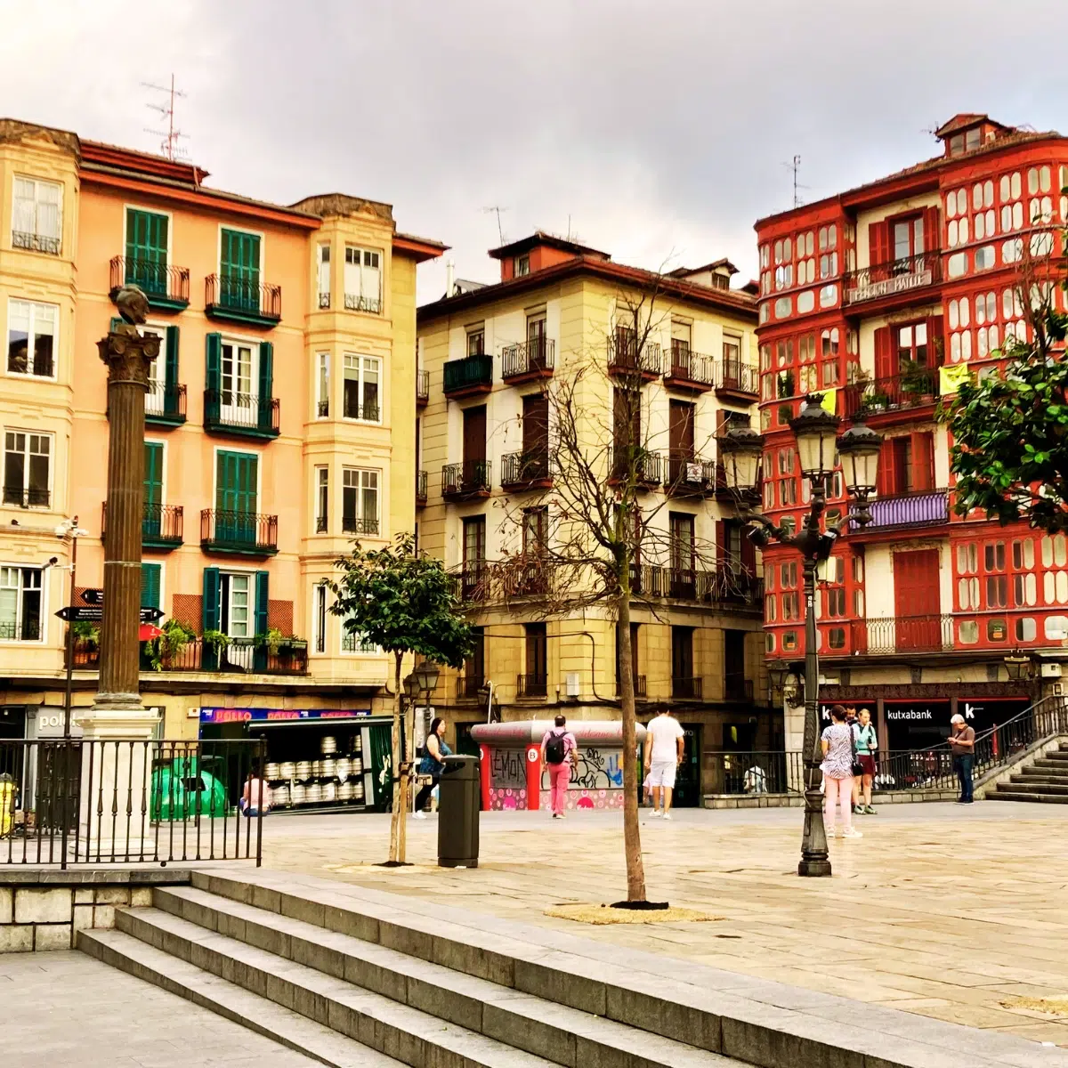 Bilbao Scavenger Hunt and Self-Guided Tour 4 Plaza Miguel de Unamuno is a majestic historic square where a grand stone staircase and the bust of the famous philosopher create a monumental gathering point in the heart of Bilbao’s Old Town.