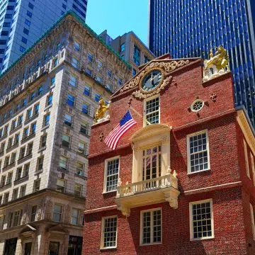 Old State House is one of Boston’s most historic landmarks, where pivotal events of the American Revolution unfolded beneath its iconic red-brick façade and golden lion statue.