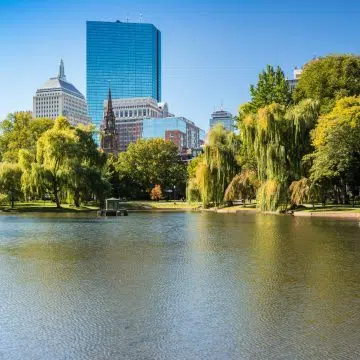 Boston Public Garden is a beautifully landscaped Victorian-era park famous for its Swan Boats, colorful flower beds, and tranquil lagoon in the center of Boston.
