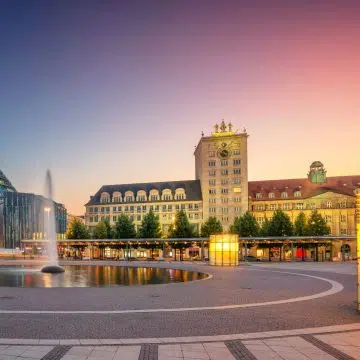 Completed in 1928 on Augustusplatz, the Krochhochhaus was Leipzig's first high-rise building, famously topped by a mechanical bell-striking clock tower inspired by the St. Mark's Clocktower in Venice.