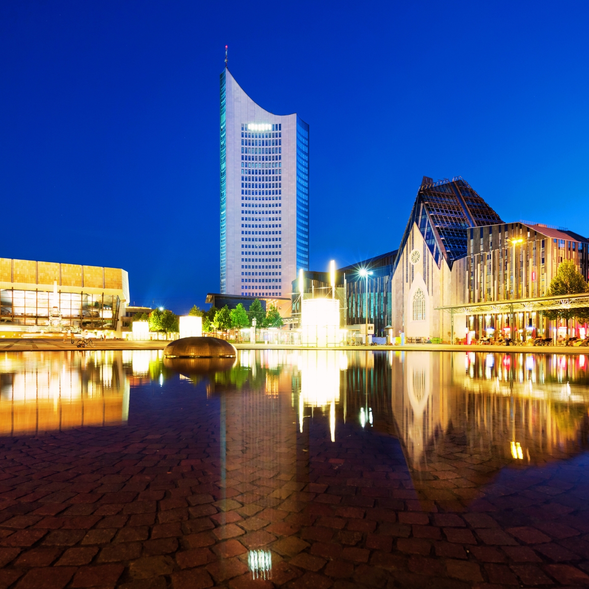 Leipzig Scavenger Hunt and Self-Guided Tour 5 Augustusplatz is a grand architectural ensemble in Leipzig that serves as one of Europe’s largest city squares, beautifully framed by the Opera House and the Gewandhaus concert hall.