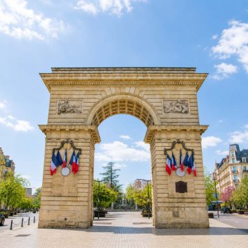 Porte Guillaume is a majestic 18th-century triumphal arch that stands as a grand entrance to the historic center of Dijon from the vibrant Darcy Square.