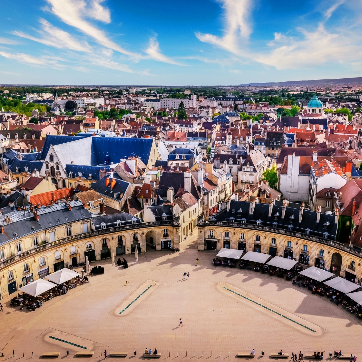 Dijon Scavenger Hunt and Self-Guided Tour 2 Place de la Libération is a majestic semicircular square where the golden stone of the Ducal Palace and elegant fountains create the most grand and historic atmosphere in Dijon.