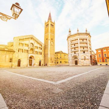 Piazza Duomo is a breathtaking ensemble of medieval art where the Romanesque architecture of the Parma Cathedral stands alongside the iconic, pink-marbled octagonal Baptistery.